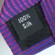 Brand and care label for Thomas Nash Men's Purple Silk Geometric Tie