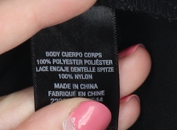 Close-up detail of Dorothy Perkins Women's Black Dress, size 10