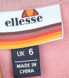 Close-up detail of Ellesse Women's Pink Pullover Hoodie, size 6