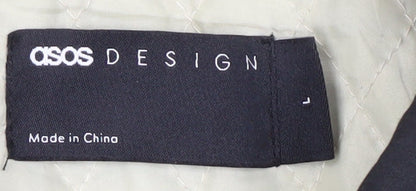 Close-up detail of ASOS DESIGN Men's Black Casual Coat, size L