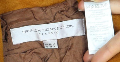 Close-up detail of French Connection Women's Brown Blazer, size 10, Regular