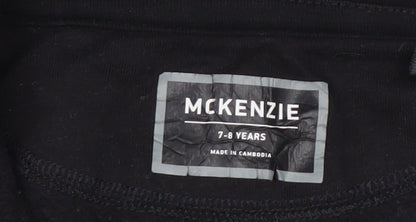 Brand and care label for McKenzie boys’ black zip-up fleece jacket 7-8 years