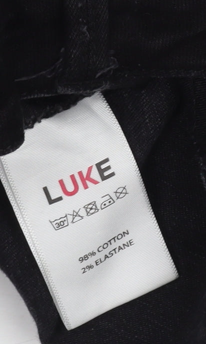Close-up detail of LUKE Men's Black Skinny Jeans, size S, 30W