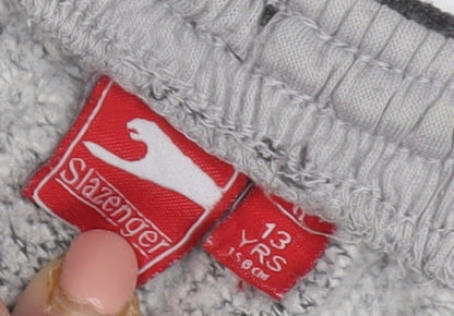 Close-up detail of Slazenger boys’ black jogger trousers 13 years