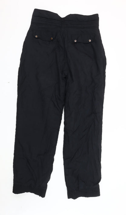 Back view of Rodeo women’s black nylon trousers, size UK 16