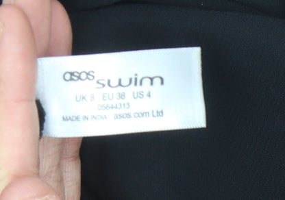 Close-up detail of ASOS Women's Black Wrap Midi Skirt -, size 8