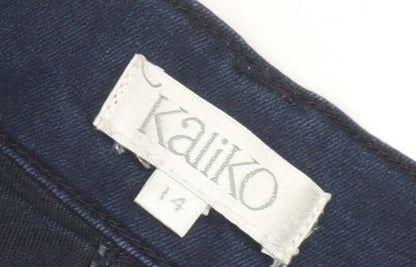 Close-up detail of Kaliko Women's Blue Skinny Jeans, size 14