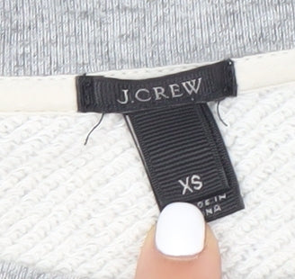 Close-up detail of J.Crew Women's Grey Pullover Sweatshirt XS