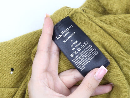Brand and care label for L.K. Bennett Women's Yellow jumper, size S