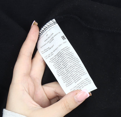 Brand and care label for JDY Women's Black Embroidered Pullover Sweatshirt Medium
