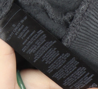 Close-up detail of ASOS DESIGN Black Men's Sweatshirt S Pullover