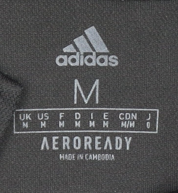Close-up detail of adidas Men's Black Polo Shirt Medium