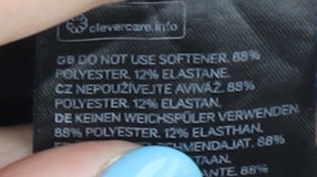 Close-up detail of H&M girls’ black athletic shorts 10-12y