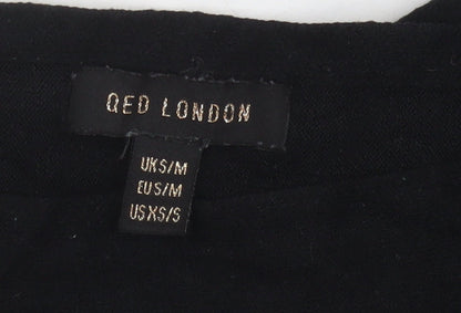 Close-up detail of QED London Women's Black Sequin jumper, S