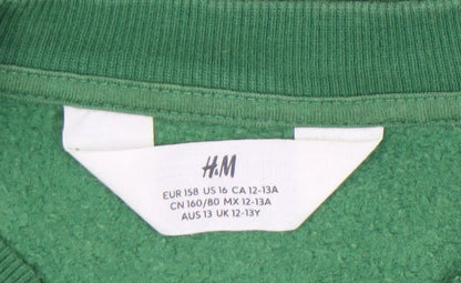 Brand and care label for H&M girls’ green graphic sweatshirt, size 12-13y pullover