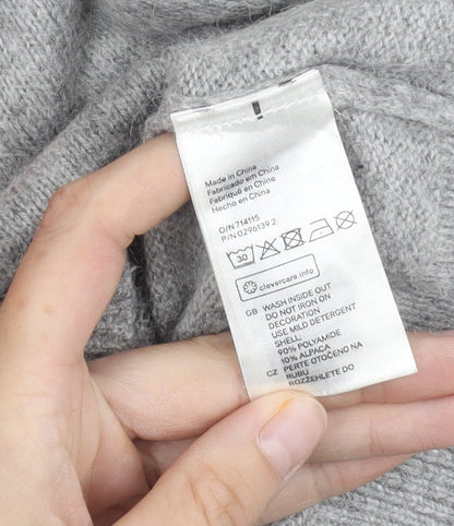 Close-up detail of H&M Women's Grey XS jumper Sequin Heart