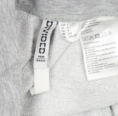 Close-up detail of H&M Women's Grey Sweatpants, size 40, Relaxed Fit