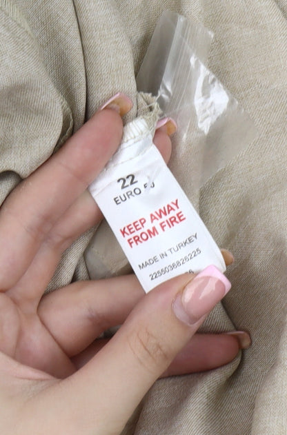 Brand and care label for Essence Women's Beige Blazer, size 18