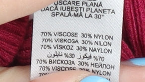 Brand and care label for Debenhams Women's Pink jumper, size 8