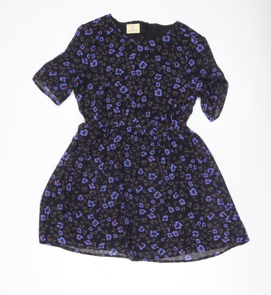 Pins and Needles Women’s Black Skater Dress M Short Sleeve Animal Print