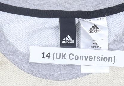 Brand and care label for Adidas women’s grey beige sweatshirt, size UK 14, pullover raglan