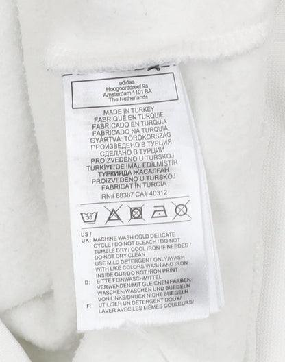 Brand and care label for Adidas women’s white xs pullover logo sweatshirt long sleeve