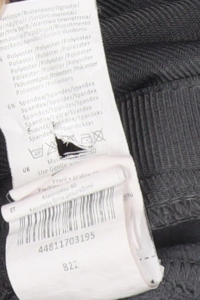 Brand and care label for Gelert boys’ black softshell jacket, size 9-10, years full zip outdoor coat
