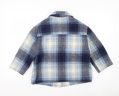 Close-up detail of Marks & Spencer girls’ blue checked wool blend coat age 5-6 years