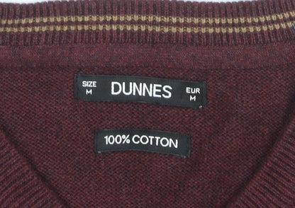 Brand and care label for Dunnes Men’s Red V-Neck Cotton Knit Jumper, size M