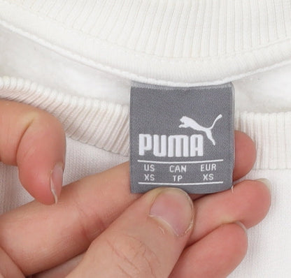Brand and care label for Puma women’s white xs pullover sweatshirt crew neck logo cotton blend