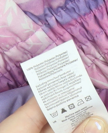Brand and care label for Disney Frozen girls’ pink purple puffer jacket coat age 11 years hooded