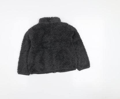 Close-up detail of Uniqlo boys’ grey fleece full zip jacket 6-7 years winter soft shell