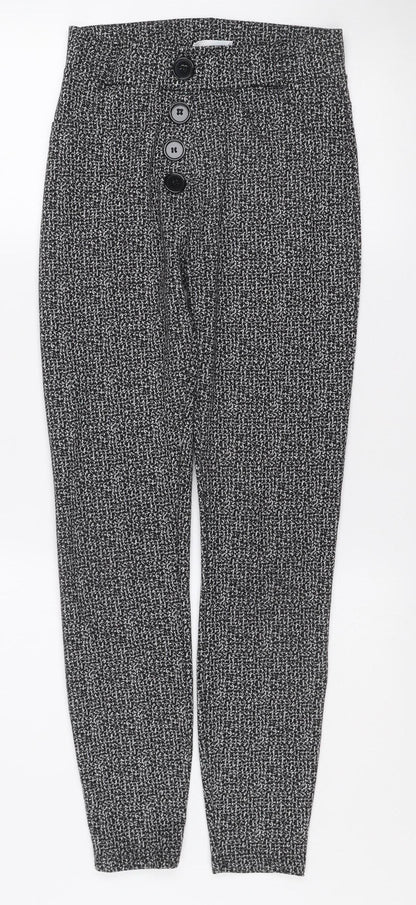 Close-up detail of Savior Women's Black Patterned Button Detail High Rise Slim Trousers, size 8