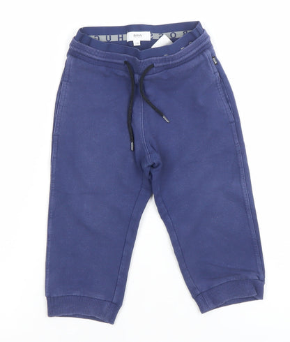 Front view of Hugo Boss boys’ blue jogger sweatpants 2 years cotton blend
