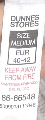 Brand and care label for Dunnes Women's Grey Roll Neck jumper, size 12
