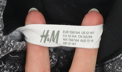 Brand and care label for H&M boys’ grey skate crew pullover hoodie 13-14 years regular fit
