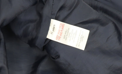 Brand and care label for US Athletic boys’ blue 11 years padded zip bodywarmer waistcoat