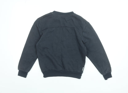 Close-up detail of Slazenger boys’ black crew neck pullover sweatshirt 9-10 years