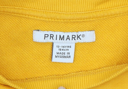 Brand and care label for Primark girls’ yellow la pullover sweatshirt 13-14 years graphic print