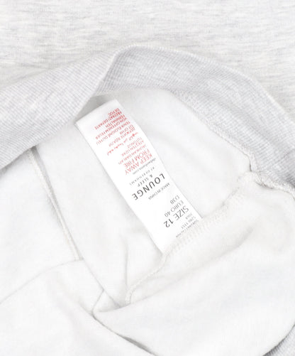 Brand and care label for Debenhams girls’ grey penguin pullover sweatshirt, size 12, years