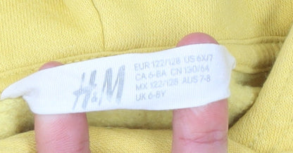 Brand and care label for H&M girls’ yellow sequin butterfly pullover hoodie -, size 6-8, years