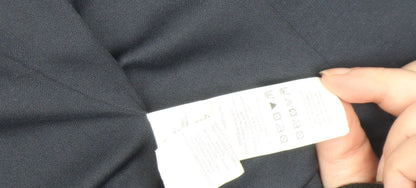 Brand and care label for Atmosphere Women's Blue Shawl Lapel Cropped Blazer, size 6