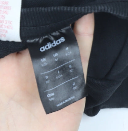 Brand and care label for Adidas boys’ black logo pullover sweatshirt 11-12 years regular fit