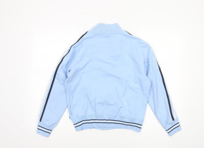 Close-up detail of Turnstyle boys’ blue mcfc track jacket, size 16, regular fit full zip