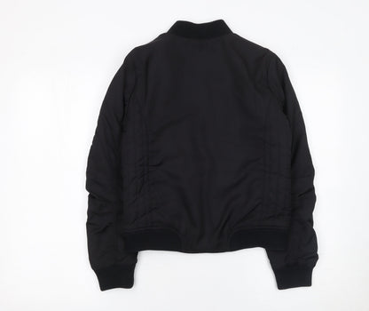 Close-up detail of Next girls’ black bomber jacket 12 years polyester lined full zip