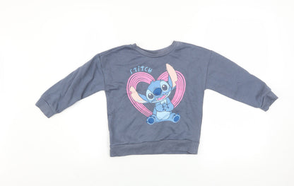 Front view of Disney at Primark girls’ blue stitch sweatshirt 5-6 years pullover
