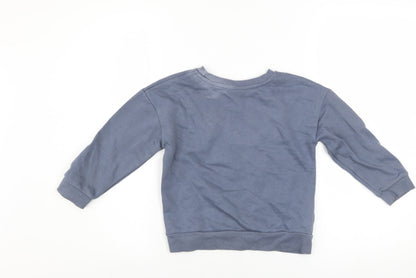 Close-up detail of Disney at Primark girls’ blue stitch sweatshirt 5-6 years pullover