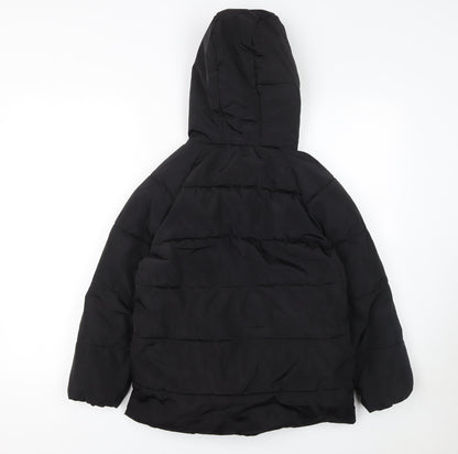 Close-up detail of RESERVED girls’ black hooded puffer jacket coat 9 years warm winter