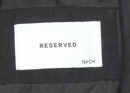 Brand and care label for RESERVED girls’ black hooded puffer jacket coat 9 years warm winter