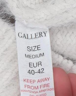 Brand and care label for Gallery Women Ivory High Neck Knit jumper, size 14